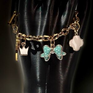 Gold Charm Bracelet with Bow and Crown